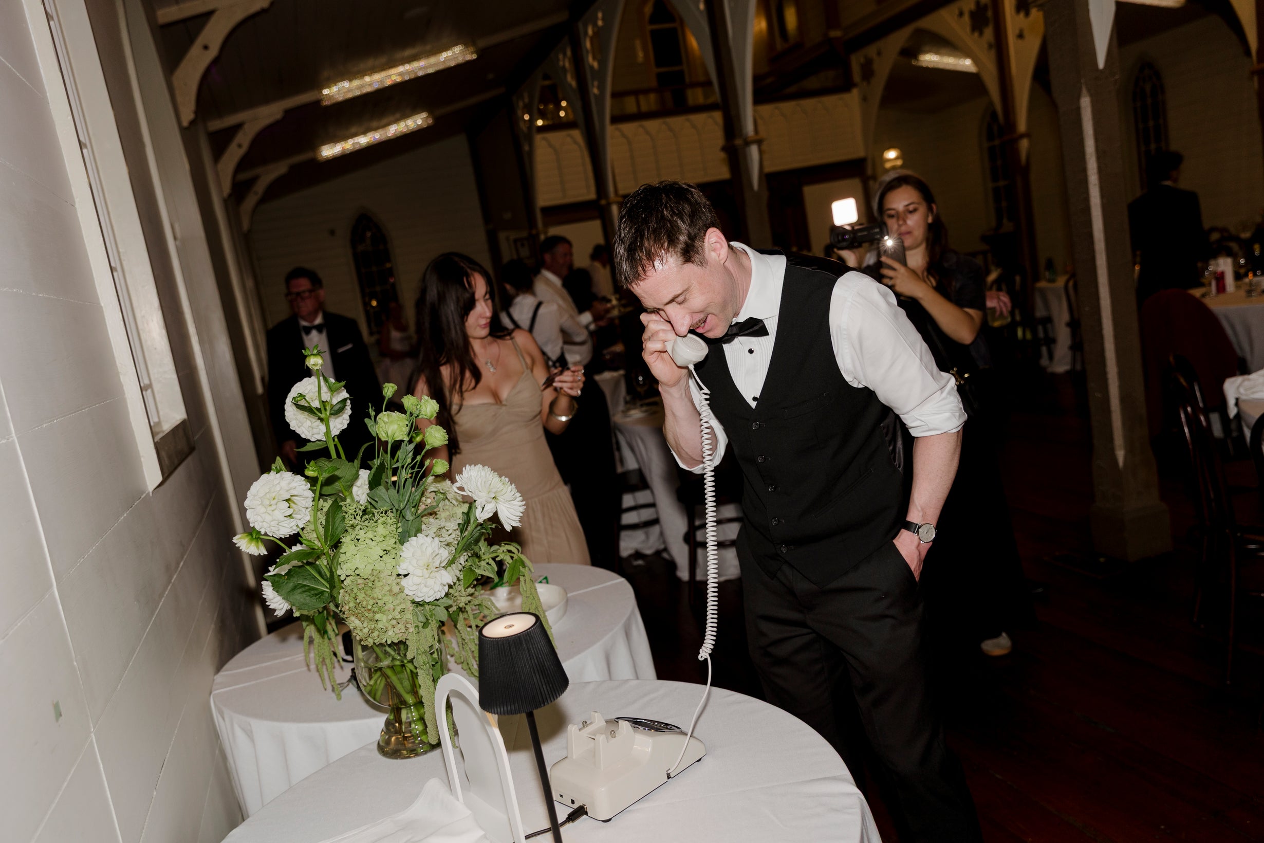 Wedding guests using an audio guestbook
